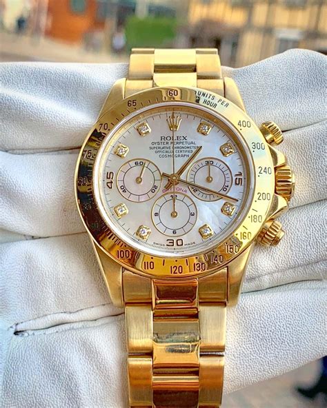 rolex gold daytona watches for sale.